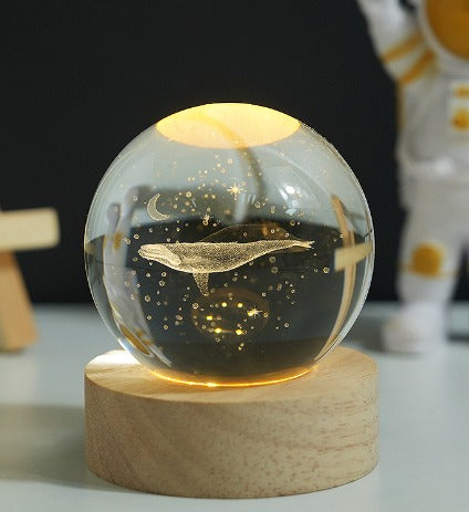 "Descubre la elegancia y calidez de nuestra Lámpara Sueños en Cristal LED Diseños 3D. Perfecta para crear ambientes acogedores y modernos en tu hogar. ¡Haz clic para iluminar tu vida!